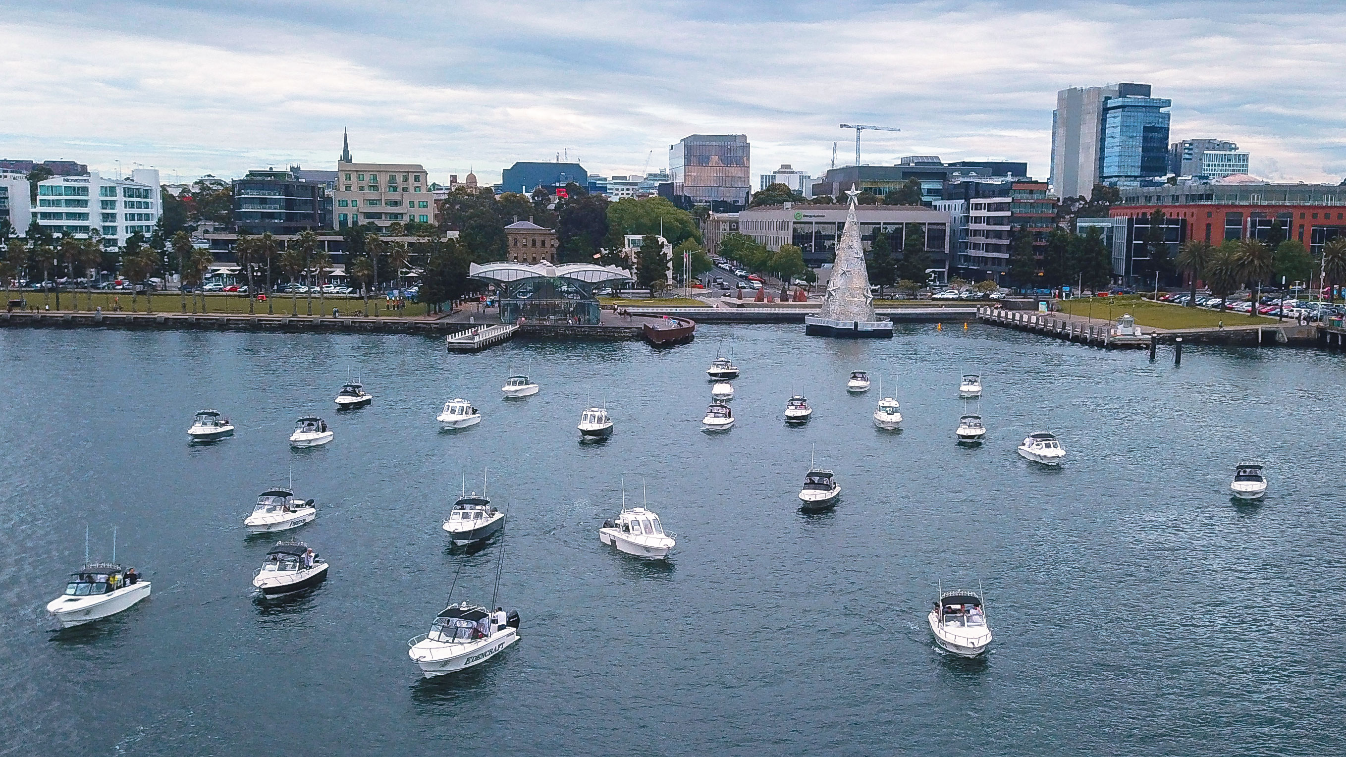 Aerial shot of the Edencraft fleet on the water at Geelong waterfront