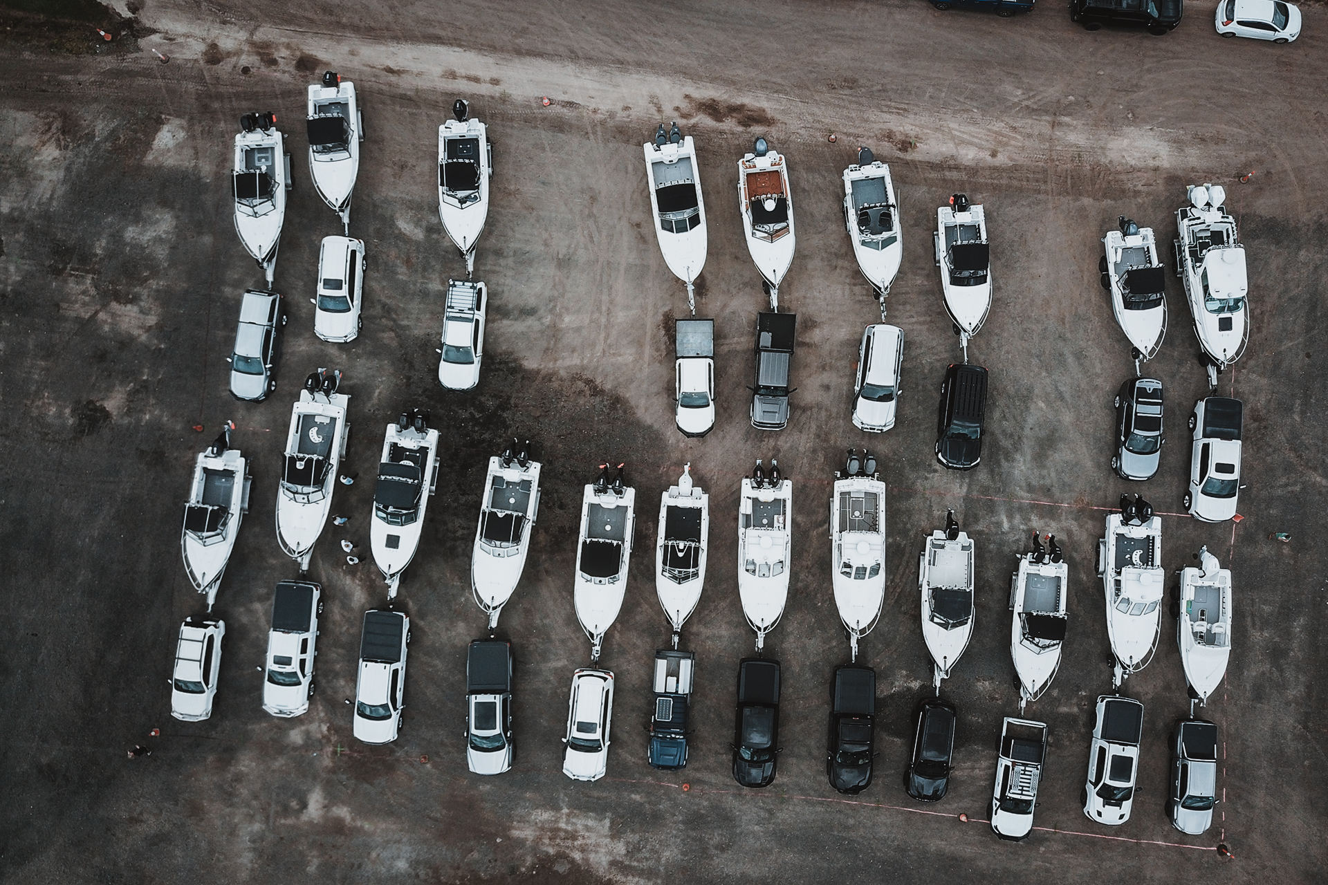 Aerial view of boats and cars parked in the Edencraft factory yard